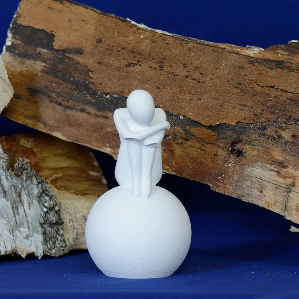 Denker auf Stein